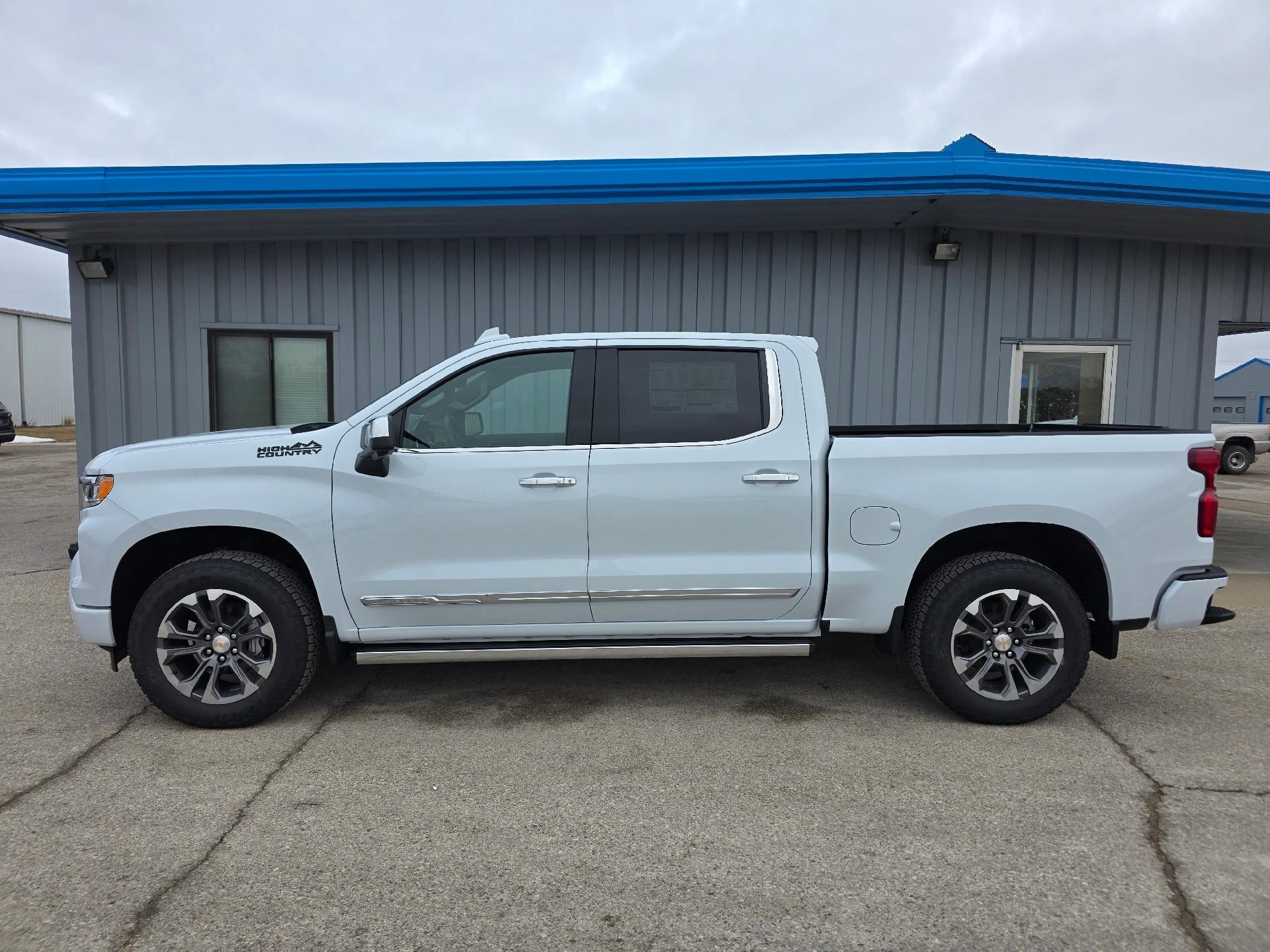 2026 Chevrolet Silverado 1500 High Country in Polar White Tricoat — front three-quarter view