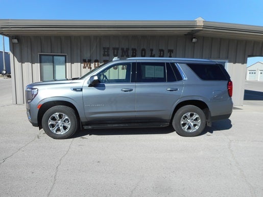 2022 GMC Yukon SLE in Satin Steel Metallic — front three-quarter view