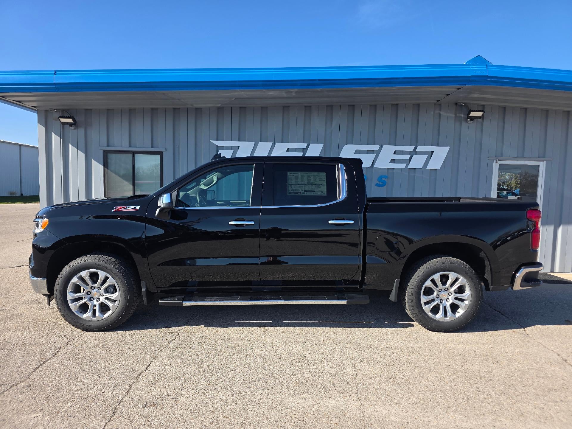 2026 Chevrolet Silverado 1500 LTZ in Black — front three-quarter view