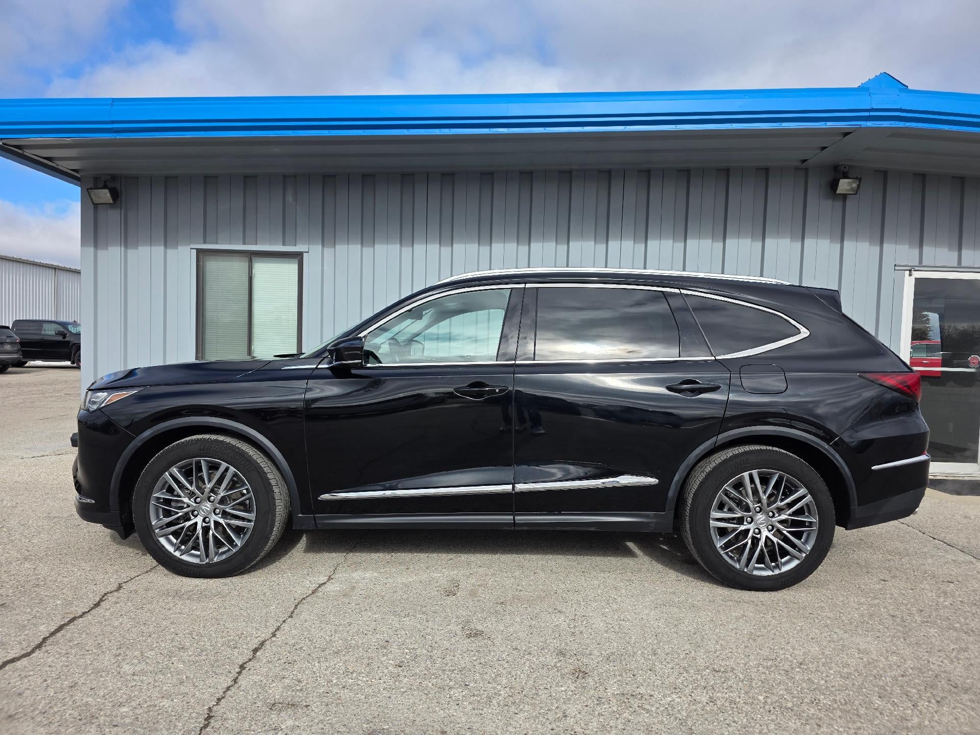 2024 Acura MDX w/Advance Package in Black — front three-quarter view